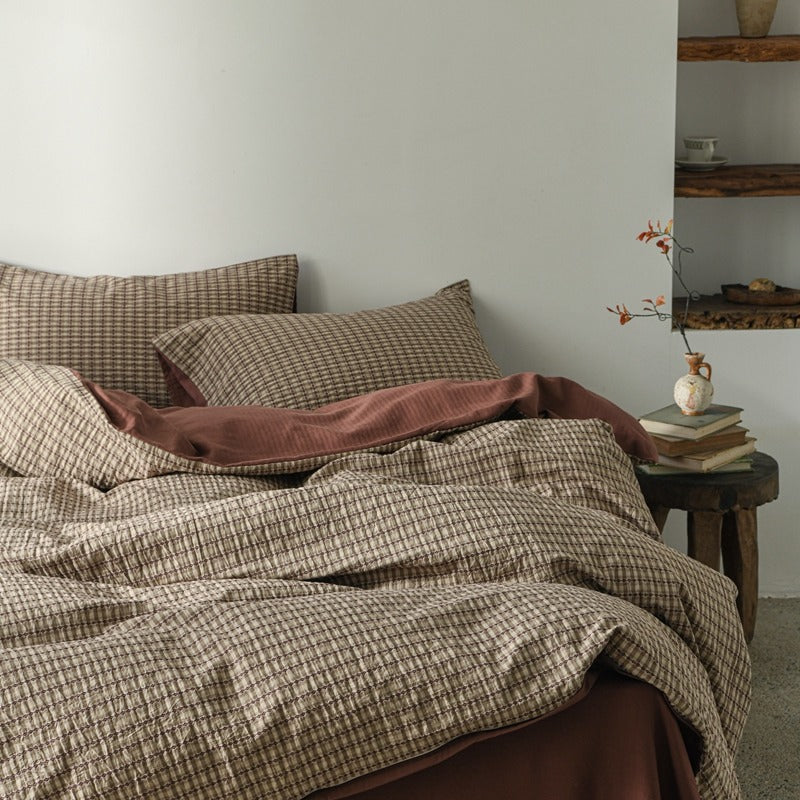 Amberlyn Mauve Mini Check cotton bedding set – bedroom view of the patterned duvet and pillows - Roomden
