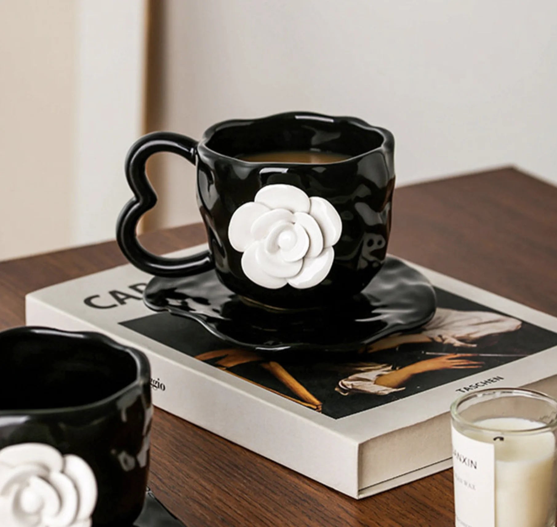 Side view of the Black Camellia Mug with its heart-shaped handle - RoomDen