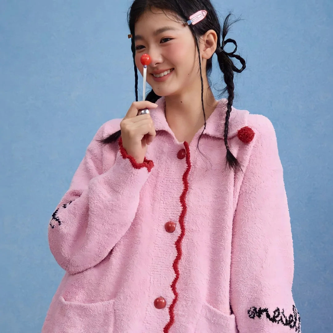 Front view of the Bubblegum Pink variant of the embroidered pom-pom fleece pajama top. - RoomDen