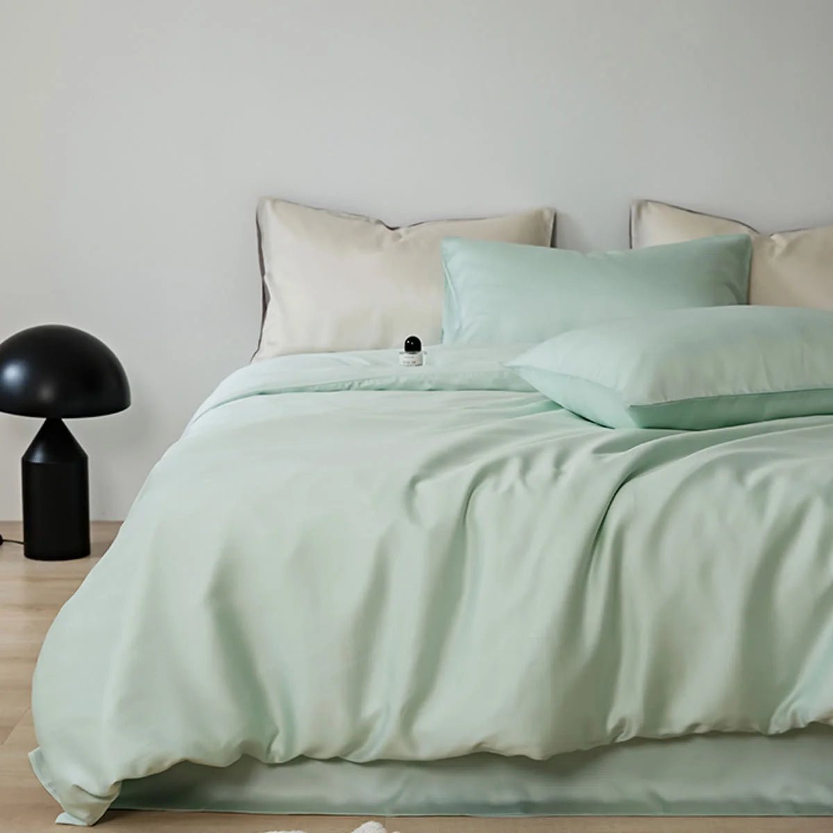 Full shot of the Silky Smooth Cooling Tencel Bedding Set in calming Mint Green - RoomDen.
