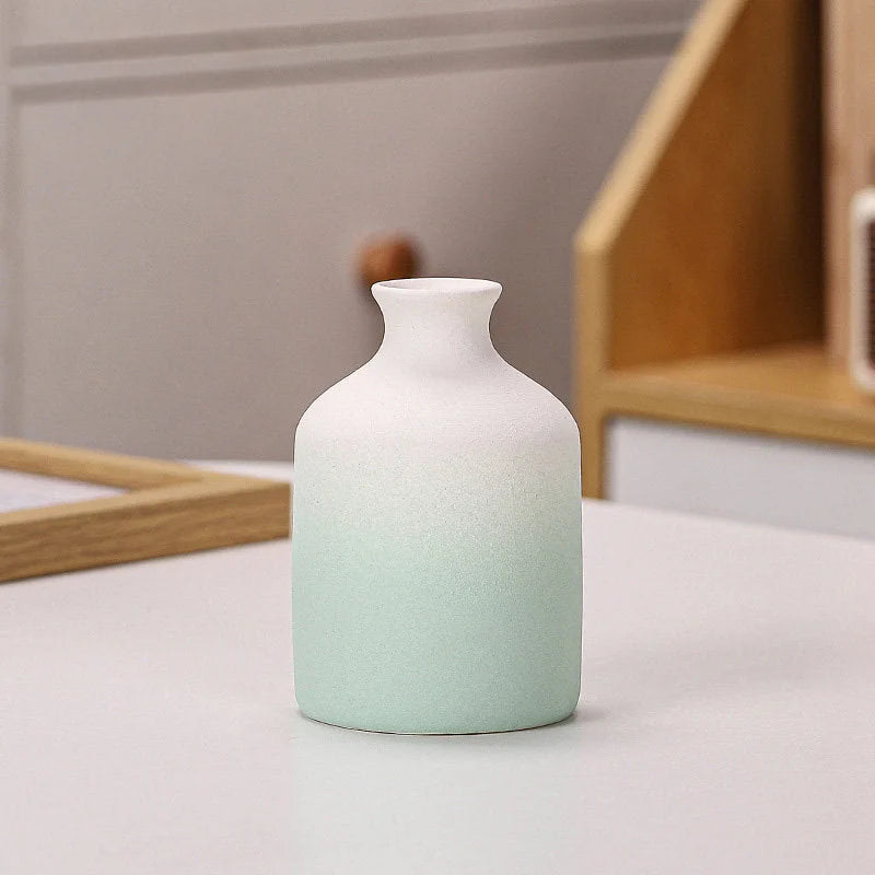 Green Ombre bottle-shaped frosted ceramic vase on a white surface - RoomDen.