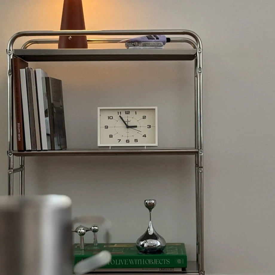 Cream White Retro Analog Table Clock on a modern metal shelf with books - RoomDen.