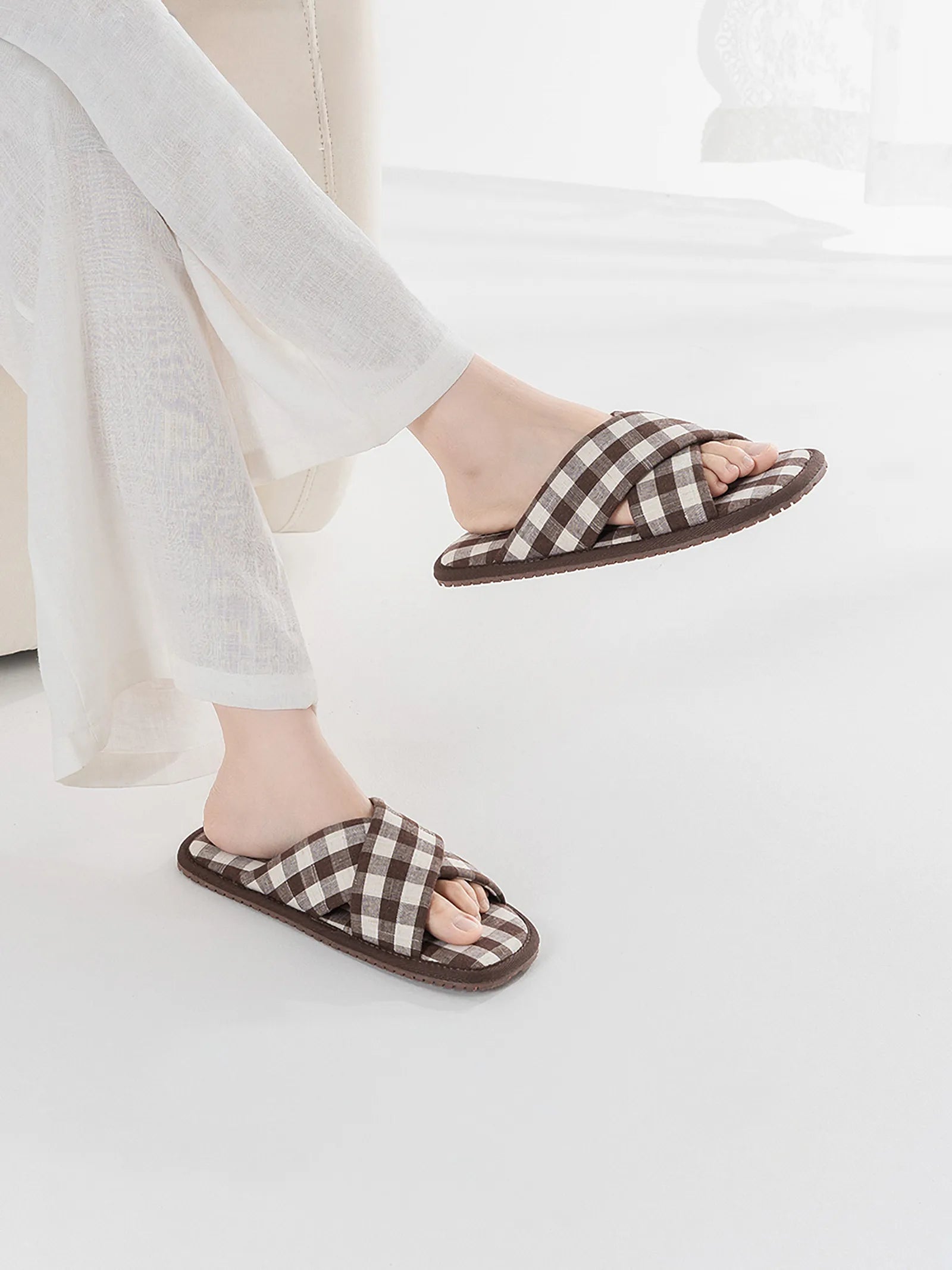 Model wearing Brown Gingham Cotton House Slippers with white linen pants - RoomDen