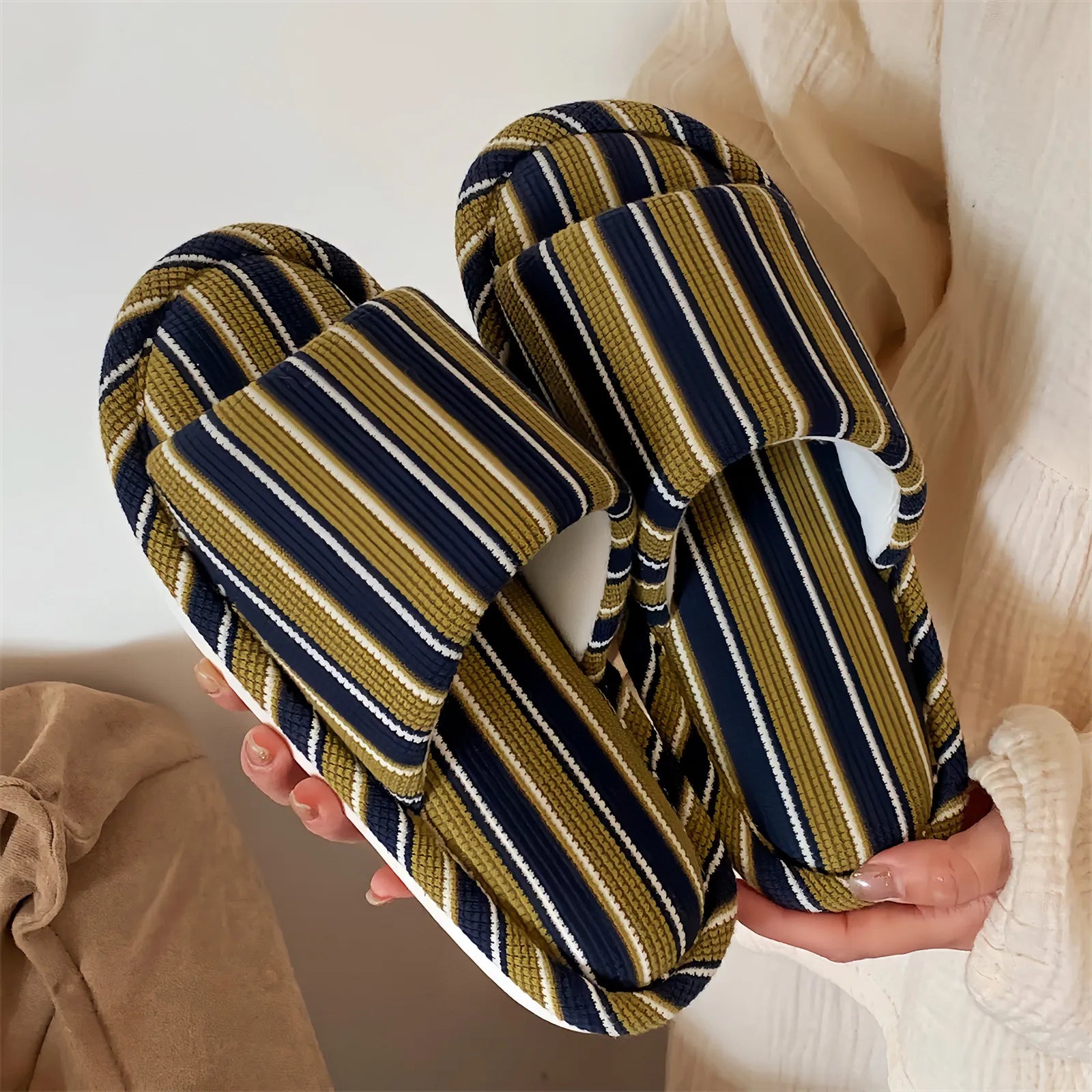 Close-up of Navy and Yellow striped slipper texture, highlighting the ribbed cotton material and soft interior lining.