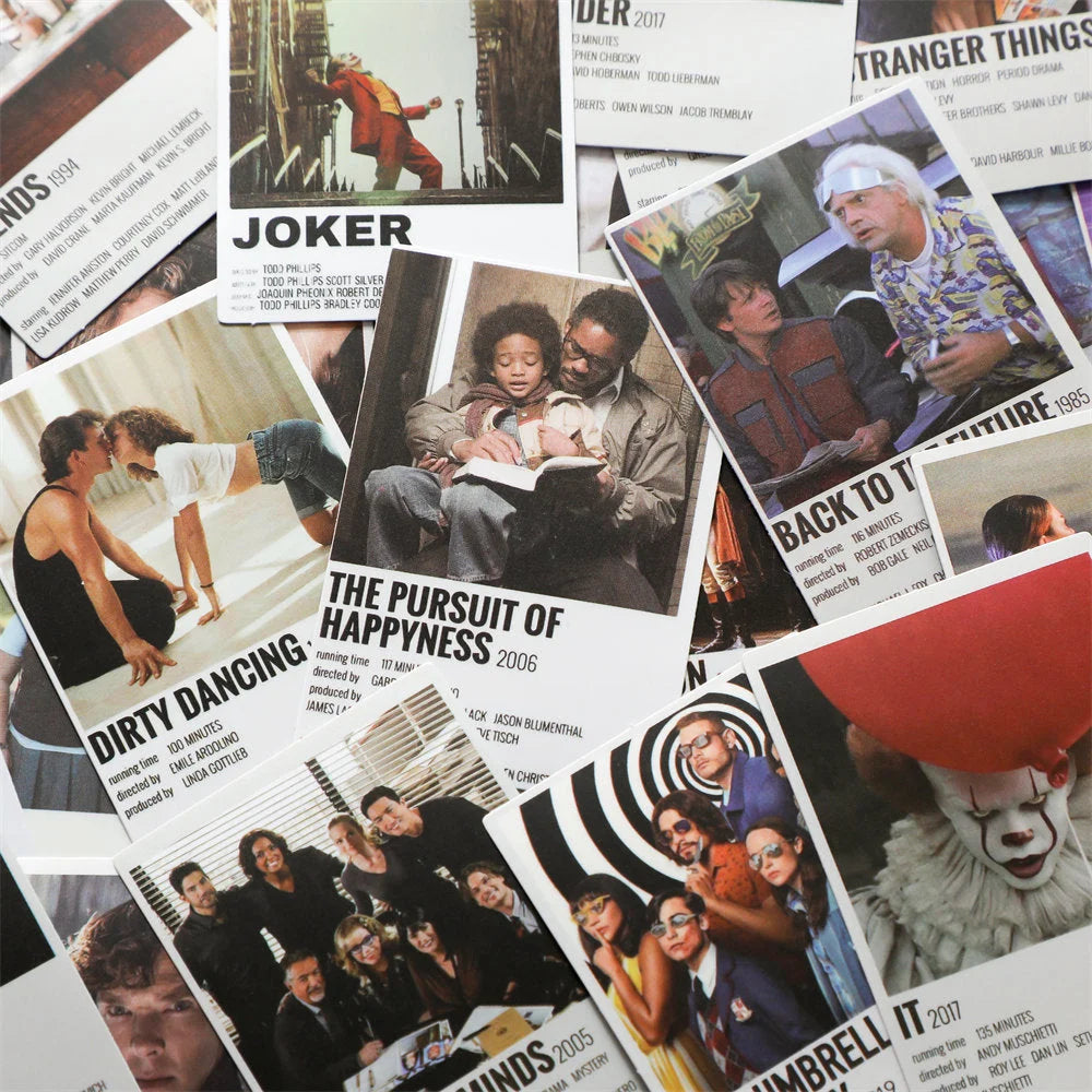 An eclectic mix of retro movie poster prints like Back to the Future and Dirty Dancing from a wall collage kit - RoomDen.