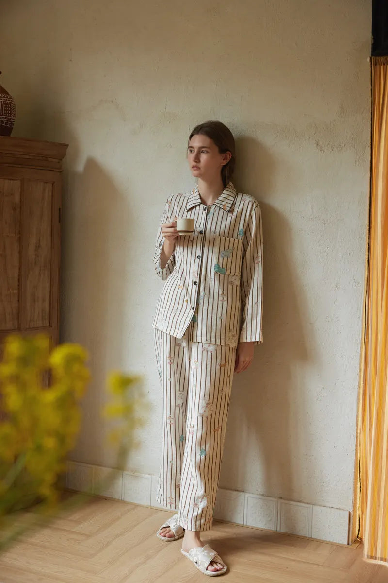 RoomDen Beige Striped Long Sleeve Pajamas Holding Coffee Cup