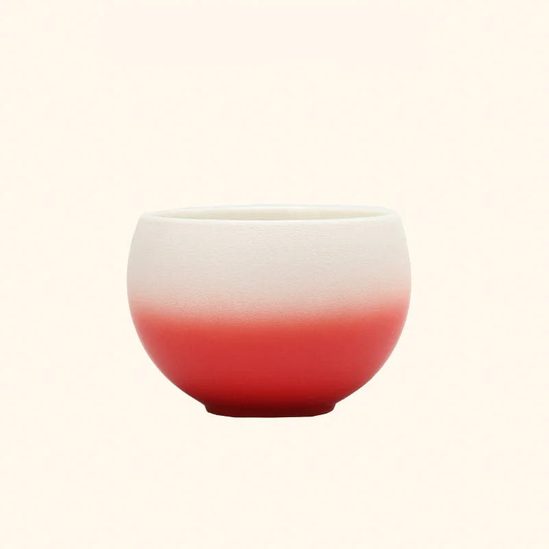 Detail shot of the Crimson Red Ombre Ceramic Cup's textured matte finish. - RoomDen