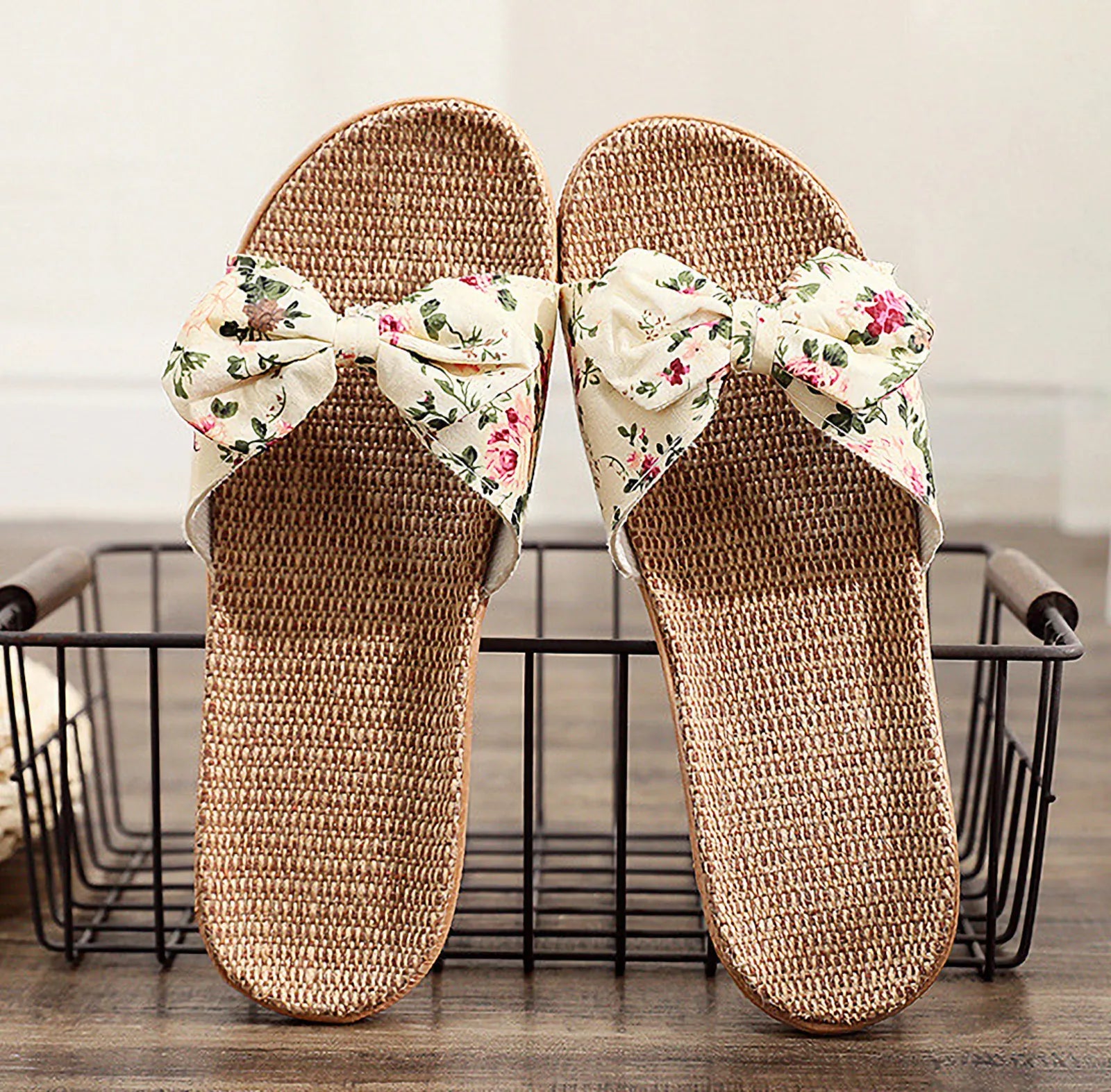 Top view of Cream Floral Linen Slippers on wire basket - RoomDen