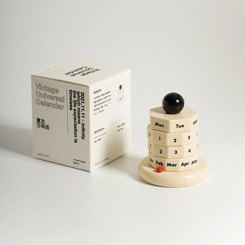 The "Vintage Universal Calendar" box and the wooden calendar set against a plain background. - RoomDen