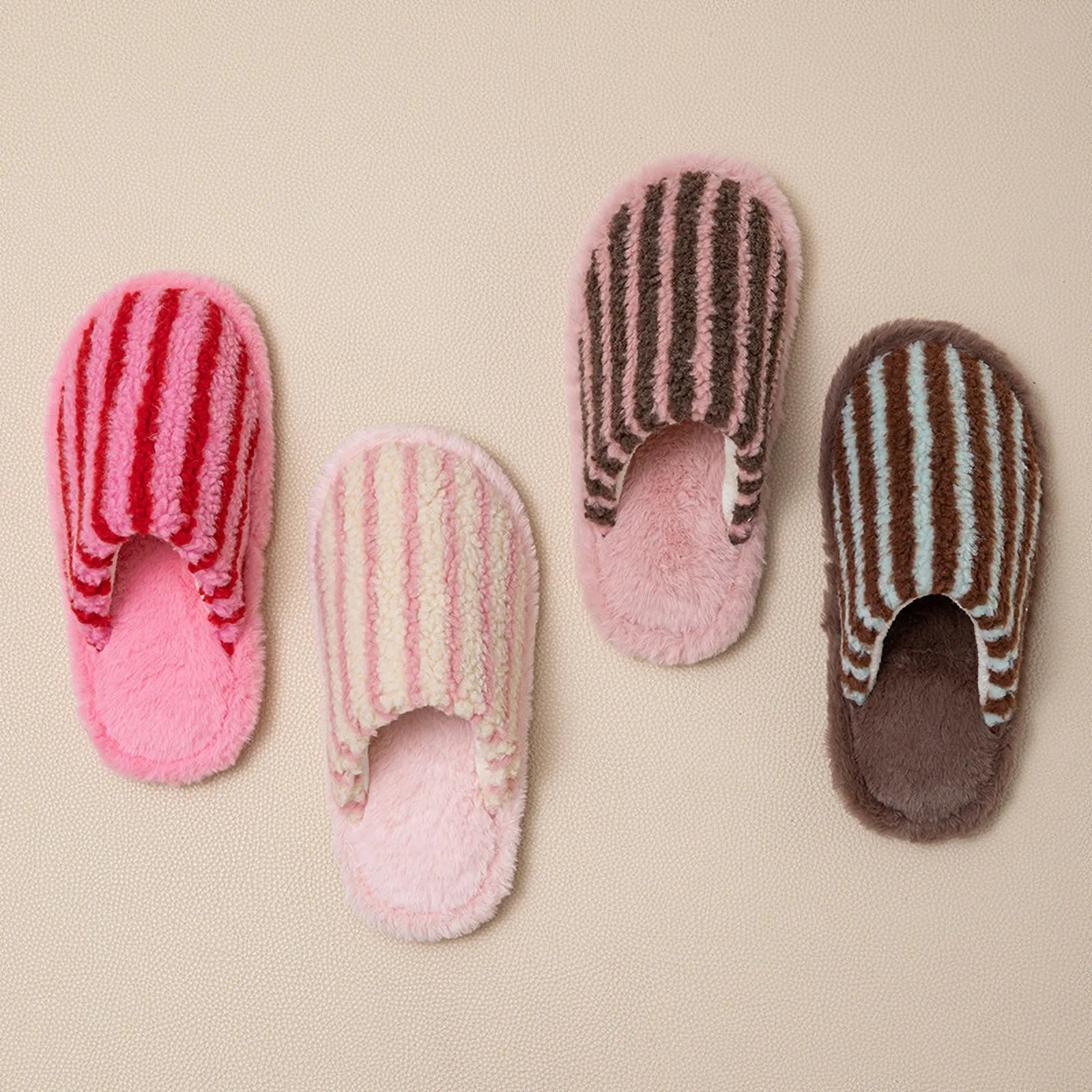 Top view comparison of Pink, Beige, Brown, and Blue striped faux fur slippers - RoomDen