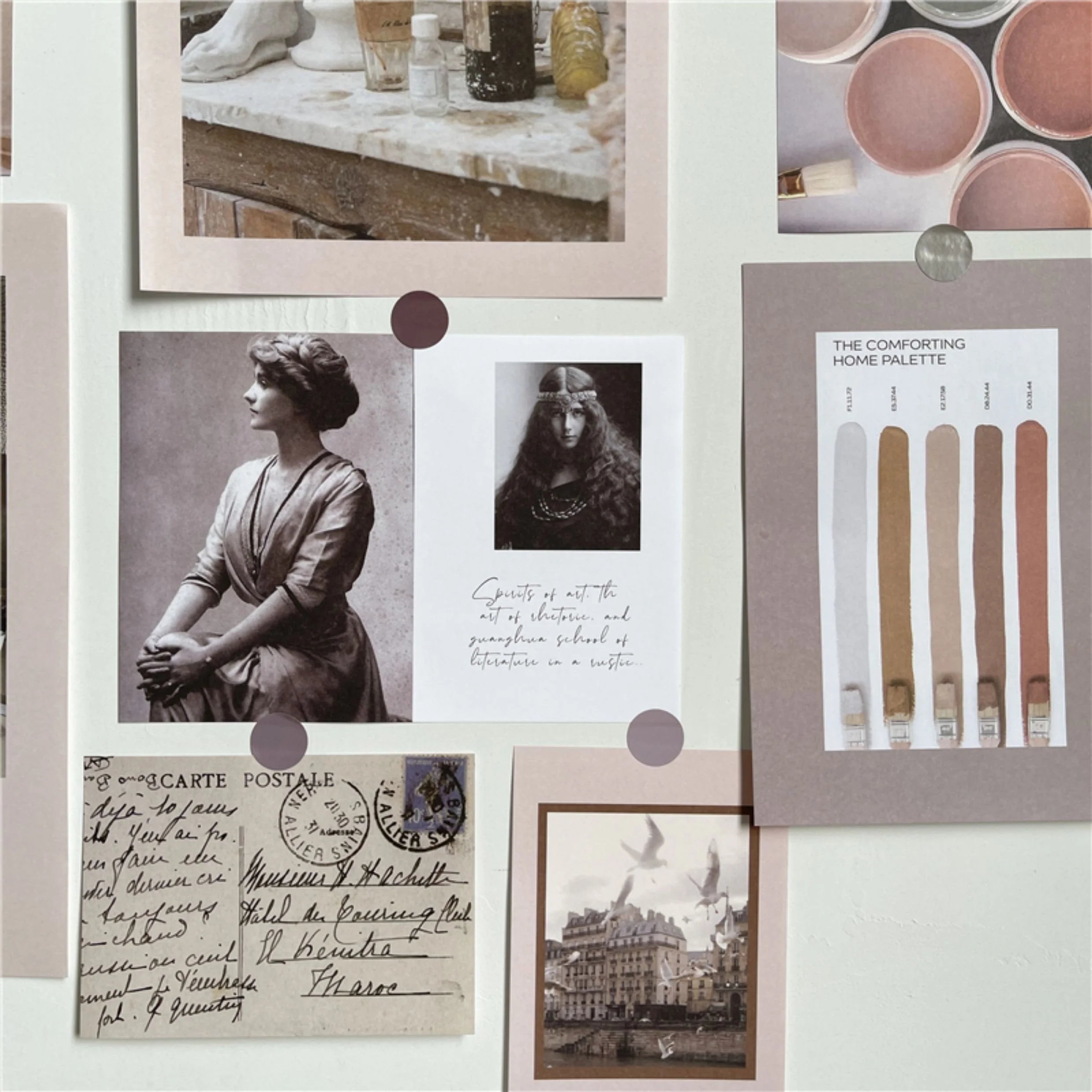 A detailed macro shot of several prints from the collage kit, including vintage postcards and a color palette card.