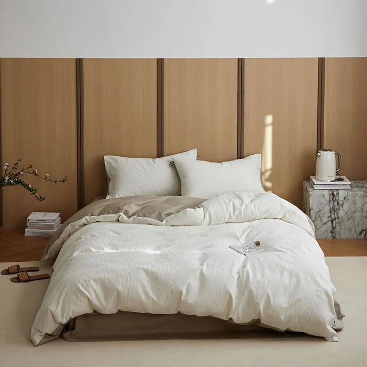 Full view of the Cream White & Beige Wavy Textured Washed Cotton Bedding Set on a wooden bed. - RoomDen