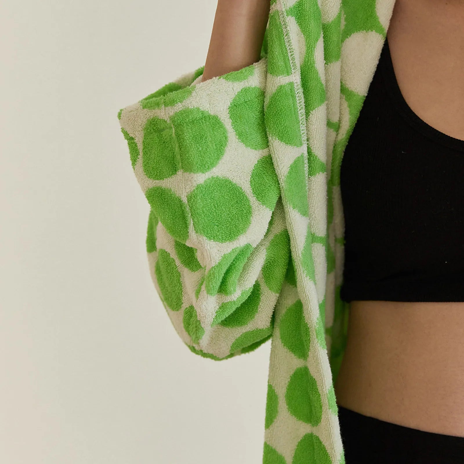 Close up detail of plush terry texture on Green Polka Dot Cotton Robe sleeve - RoomDen