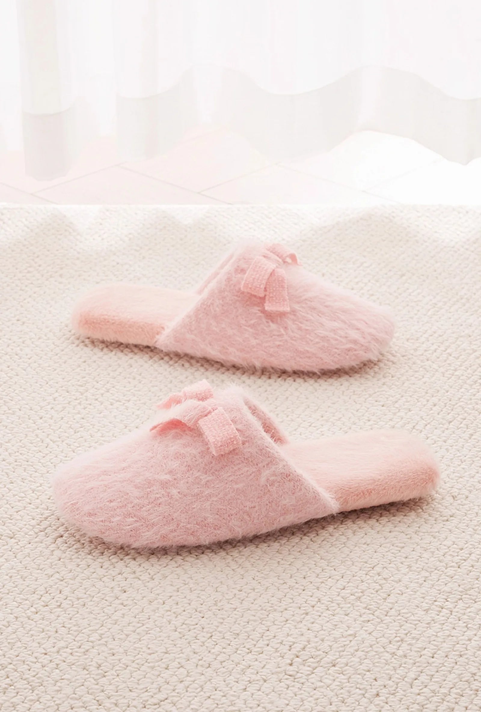 Baby Pink Fuzzy Bow Detail House Slippers on Rug - RoomDen