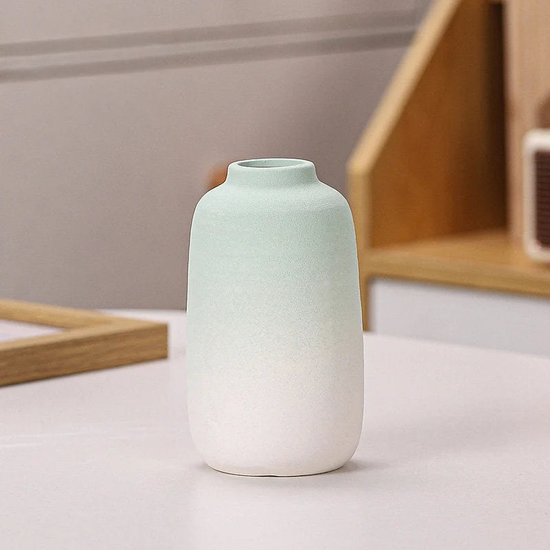 Green Ombre cylinder-shaped frosted ceramic vase on a white surface - RoomDen.