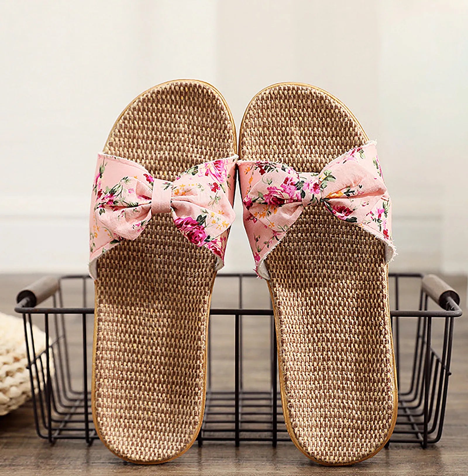 Top view of Pink Floral Linen Slippers on wire basket - RoomDen