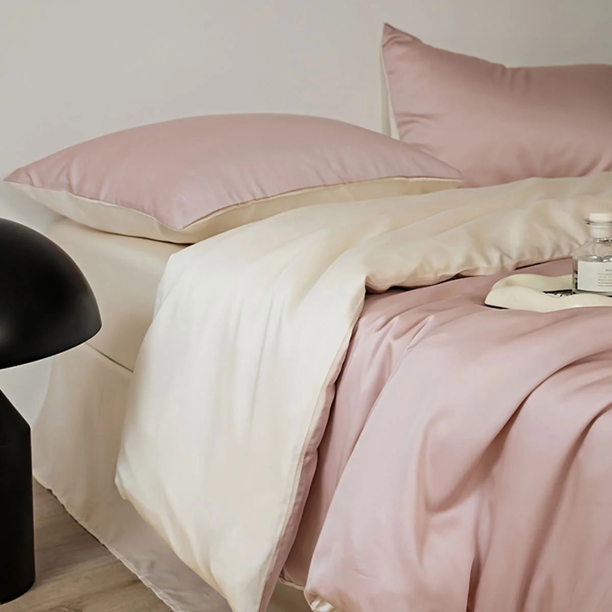 Close-up of the Dusty Rose Cooling Tencel duvet cover showing its smooth texture and light sheen.