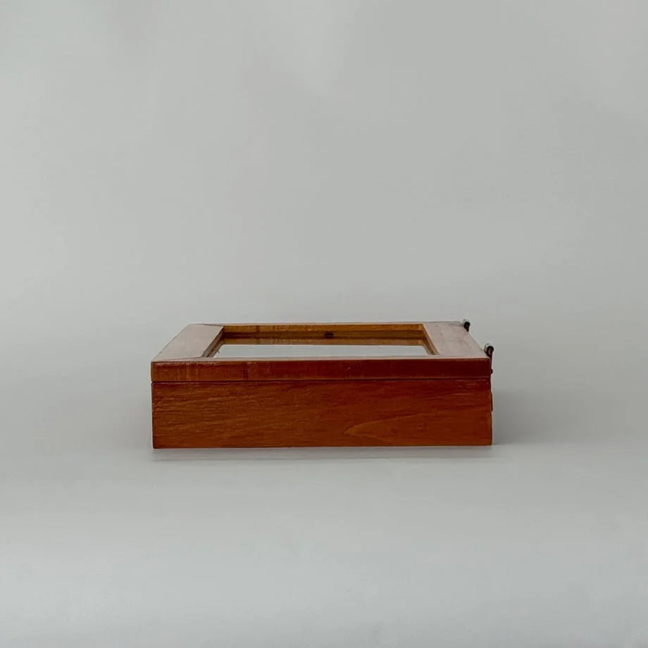 Side profile of the closed wood jewelry box showing its clean lines and grain. - RoomDen