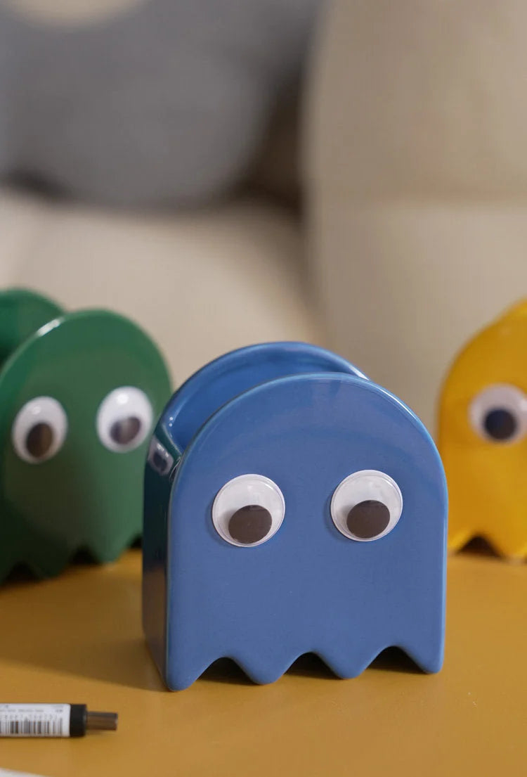 Close-up shot of the blue Retro Ghost Ceramic Pen Holder showing its glossy finish and googly eyes - RoomDen.