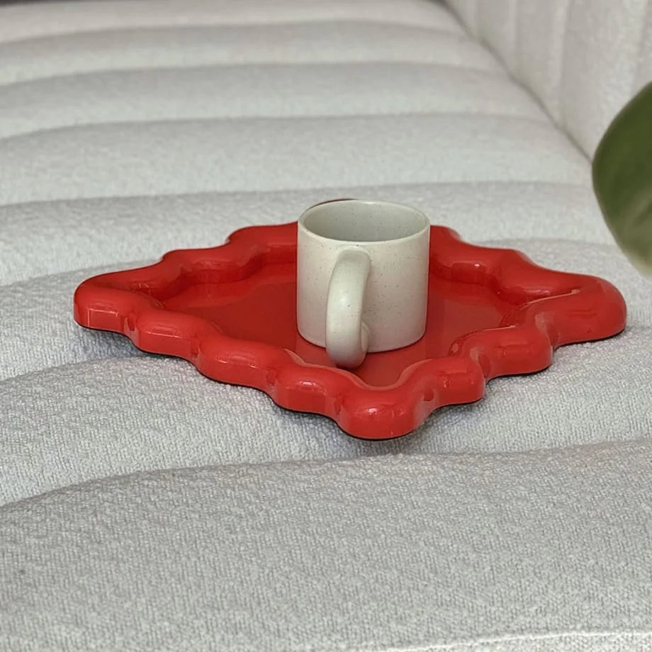 Detailed view of the Cherry Red tray's unique cloud-like shape and glossy surface - RoomDen