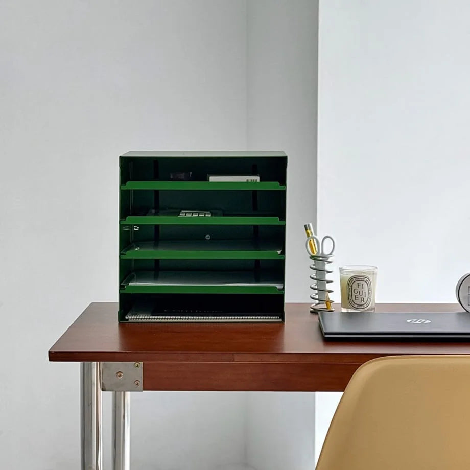 Front view of the Kelly Green metal desktop organizer holding papers on a desk - RoomDen.