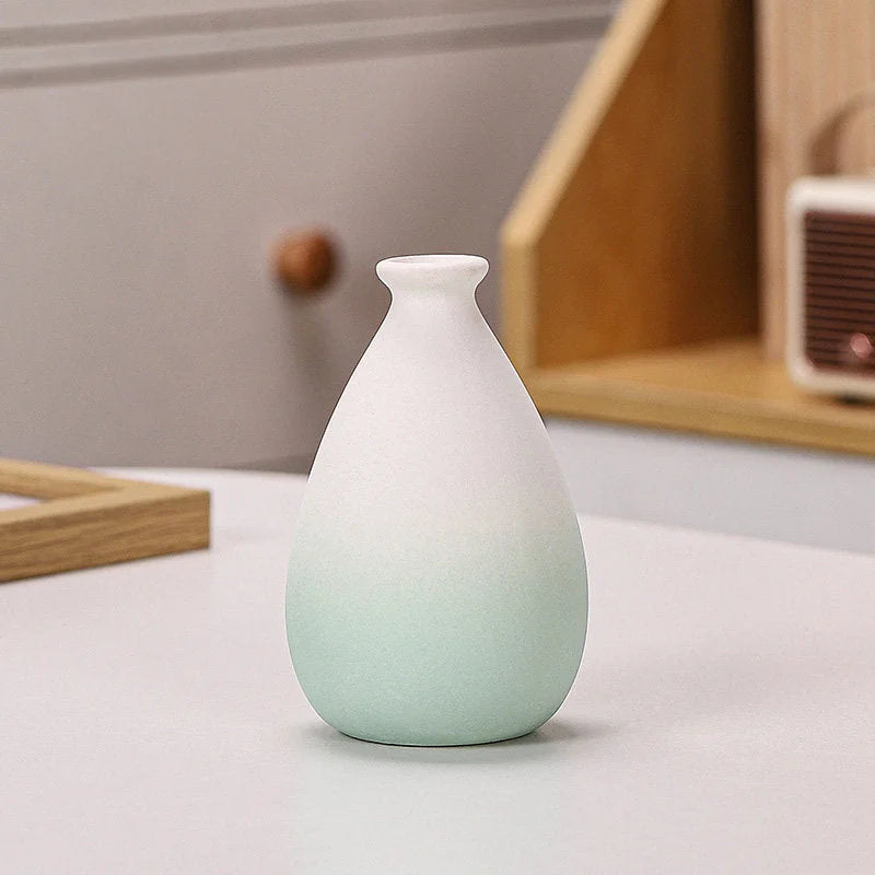 Green Ombre cylinder-shaped frosted ceramic vase on a white surface - RoomDen.