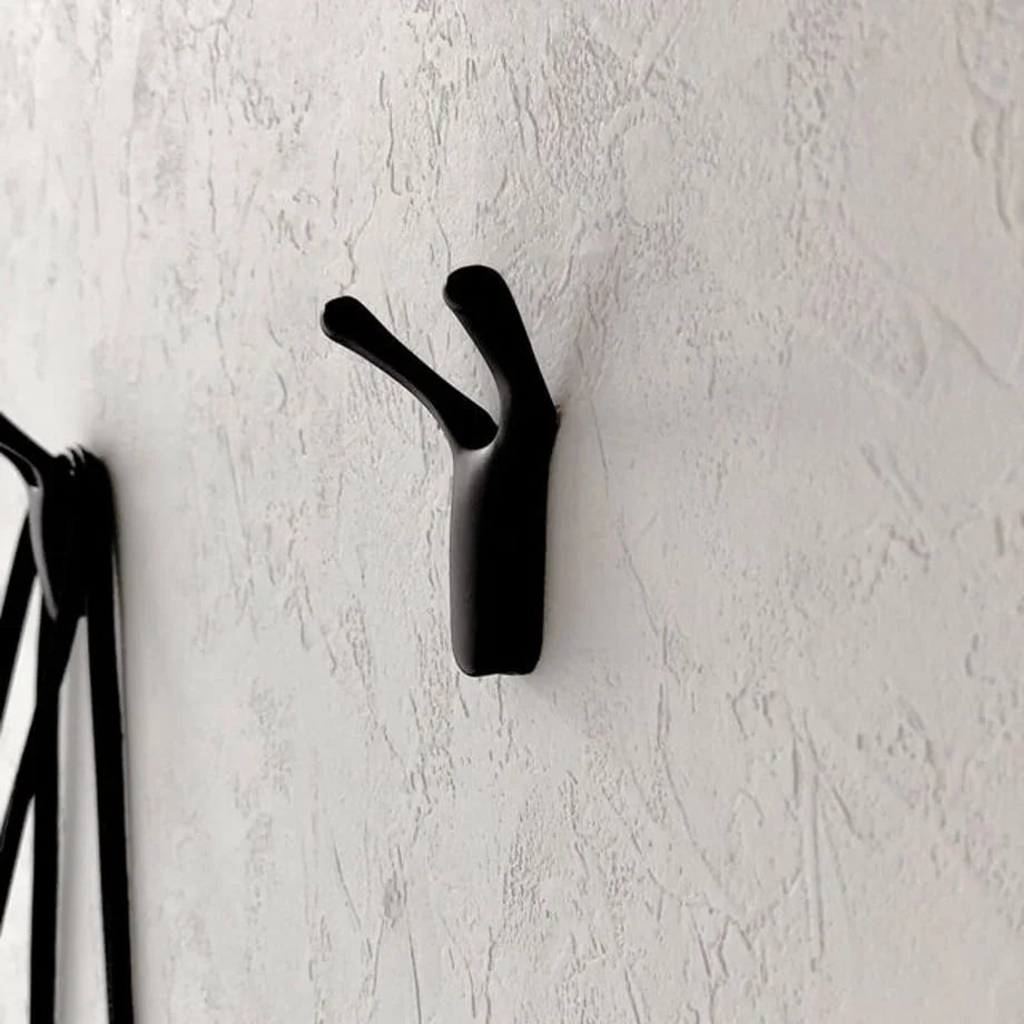 Variant Detail: Detailed close-up of the matte black finish on the Y-shaped decorative wall hook - RoomDen