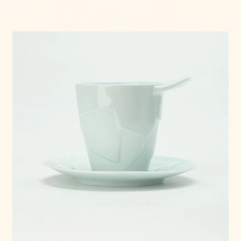 The Glacial Cyan Textured Geometric Ceramic Coffee Cup and matching saucer set - RoomDen
