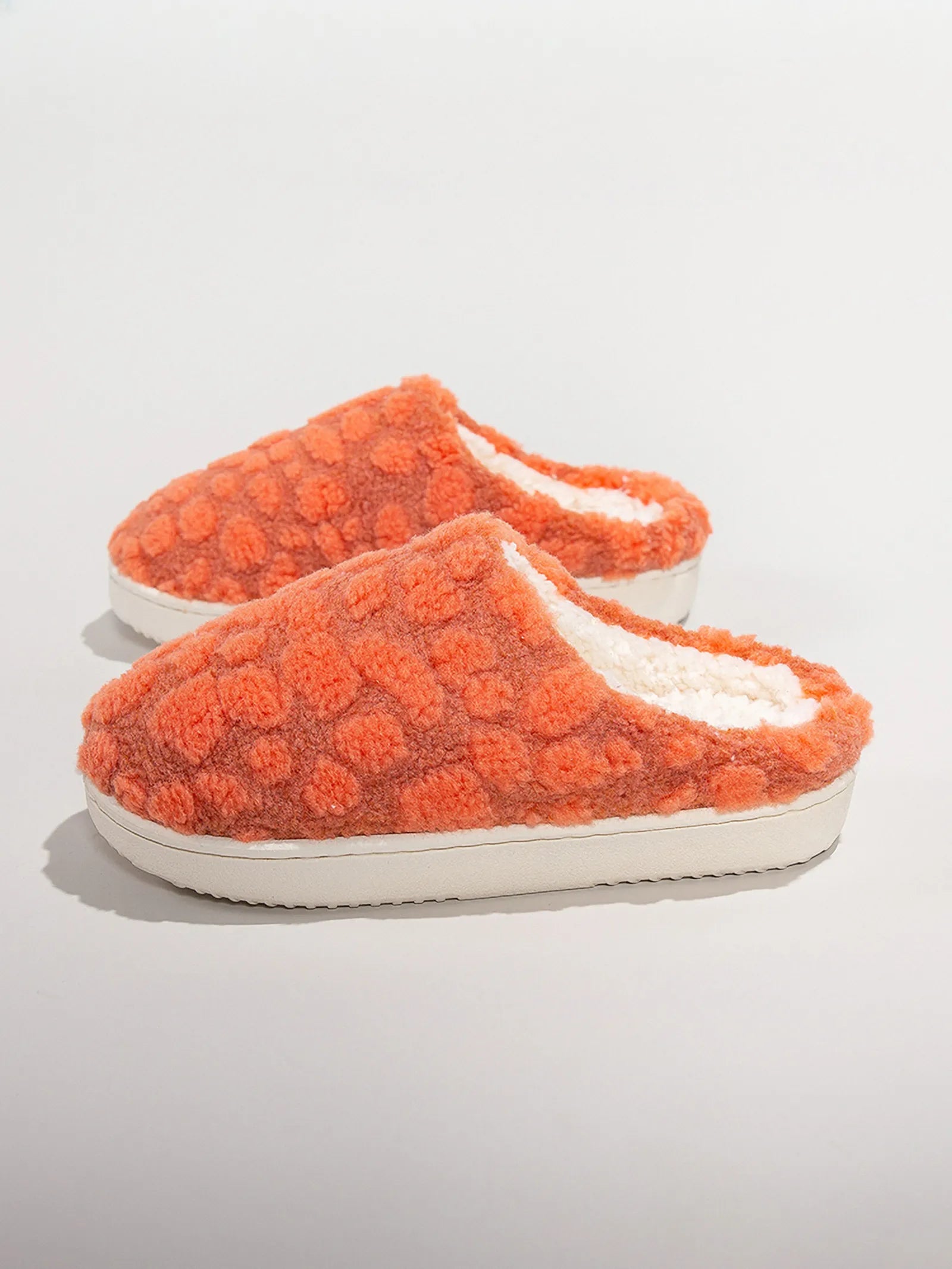Pair of Orange Plush Bubble Textured Fleece House Slippers top view - RoomDen