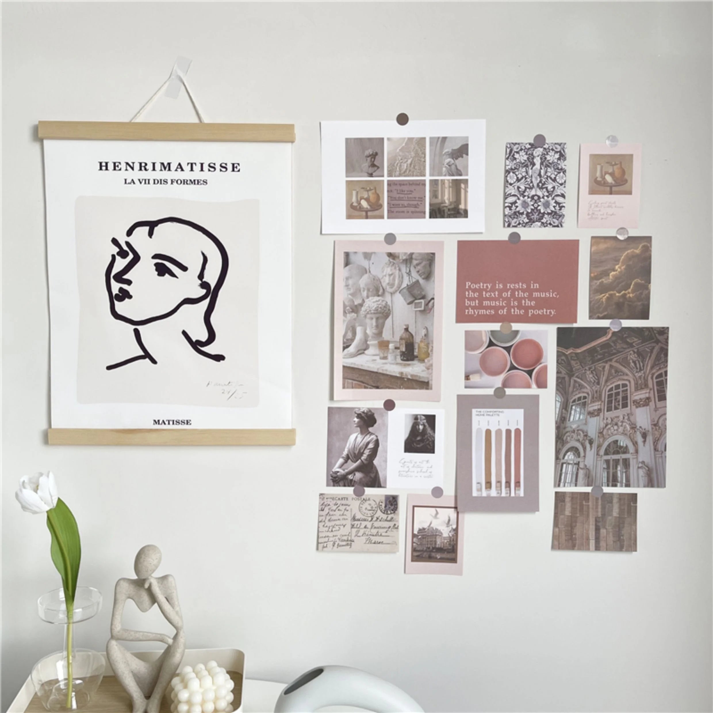 Light Academia wall collage kit displayed next to a framed Matisse print, showing a styled study area - RoomDen.