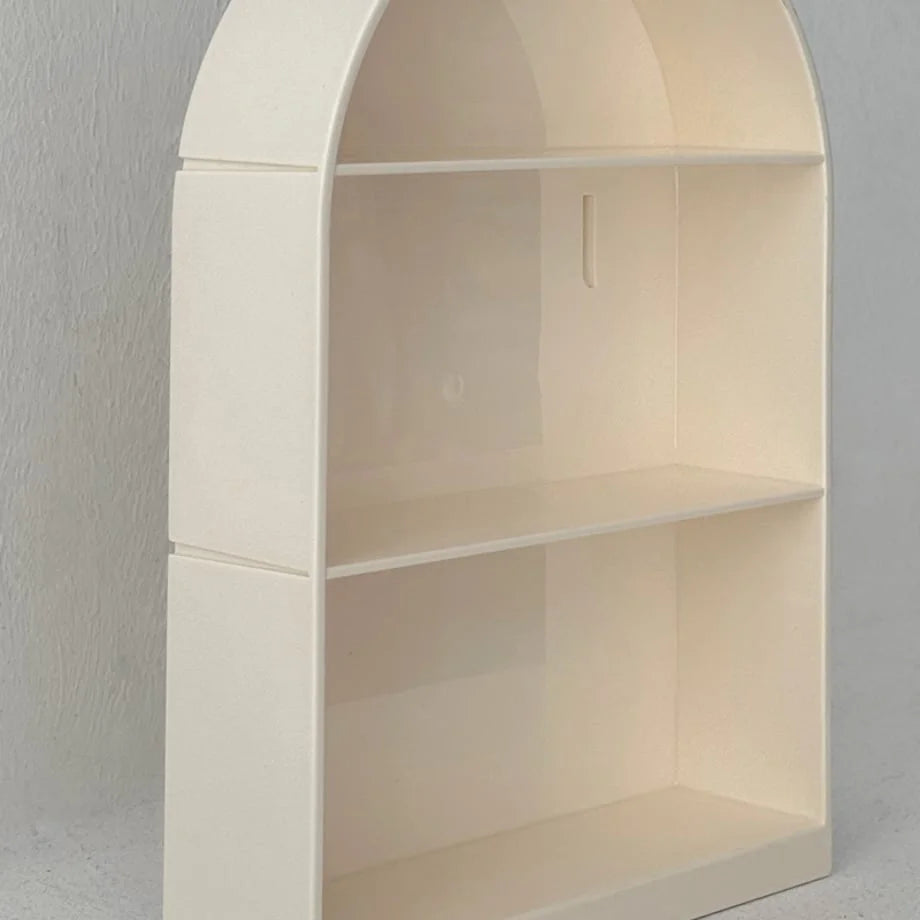 Close-up angled view of the interior of the two-tiered arched wall shelf - RoomDen.