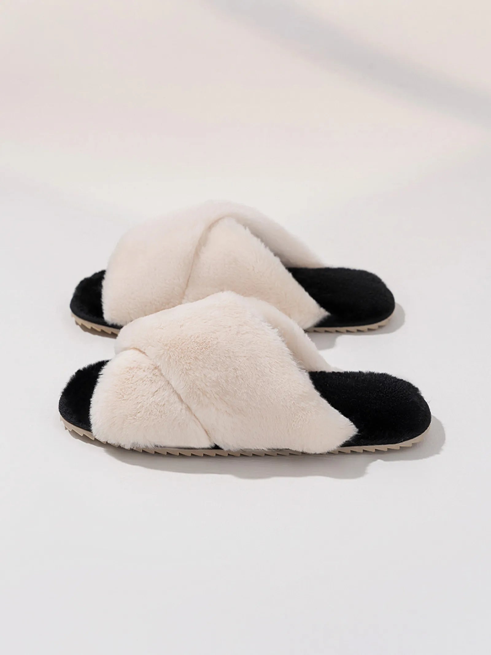 Side view of White and Black fluffy cross-band slides showing plush texture - RoomDen