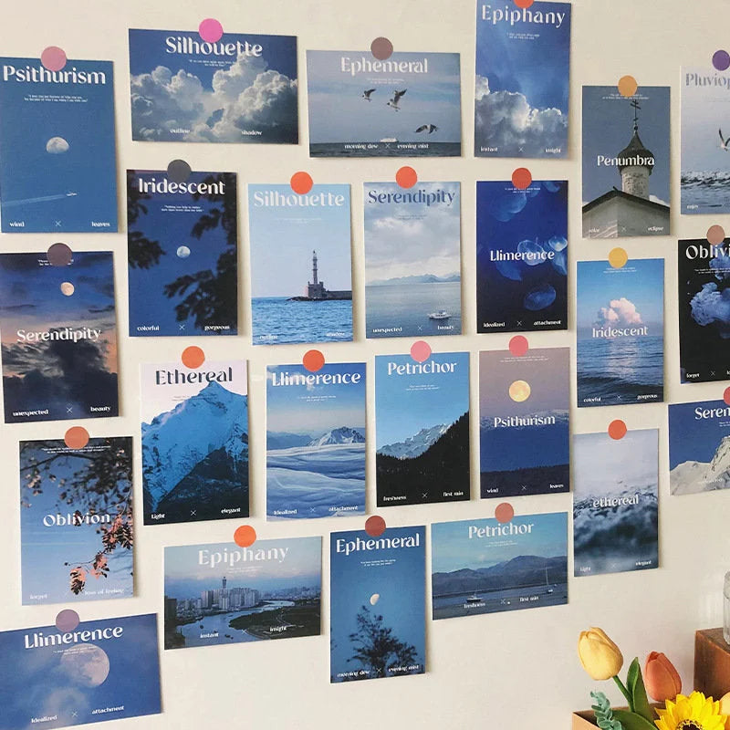 Angled view of the blue-toned aesthetic wall collage kit, showcasing prints with words like "Silhouette" and "Ephemeral" for a Dark Academia vibe.