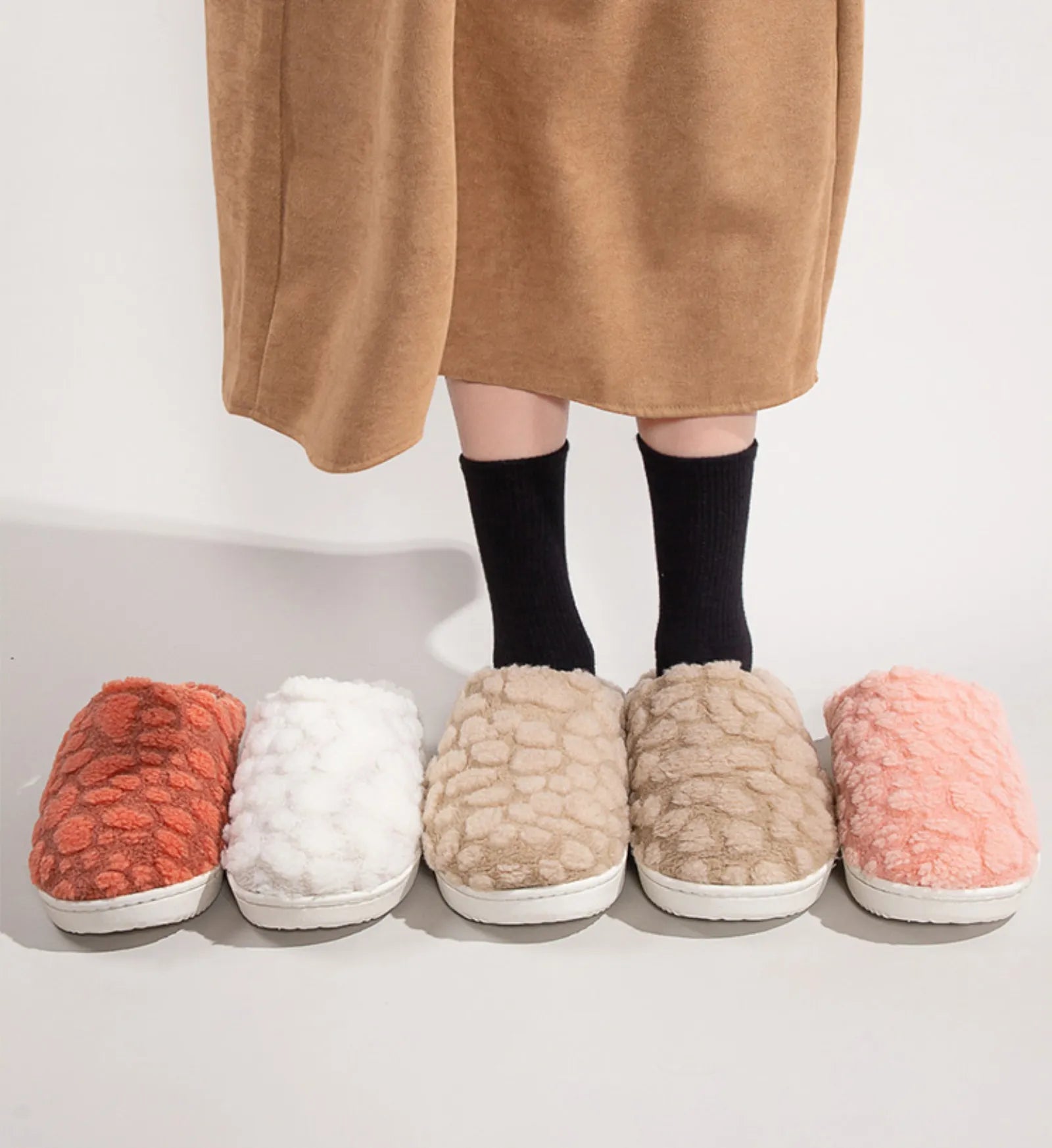 Group shot of Plush Bubble Fleece Slippers in Pink Orange White and Beige - RoomDen