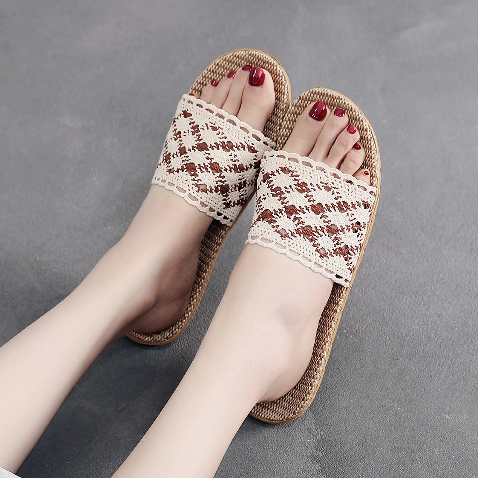 Model wearing white and green patterned crochet linen slides - RoomDen
