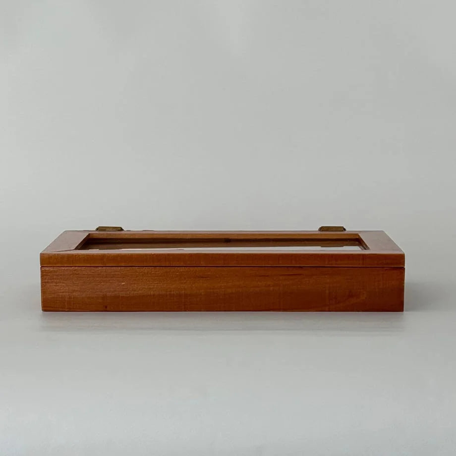 Front view of the closed minimalist wood jewelry box on a plain background. - RoomDen