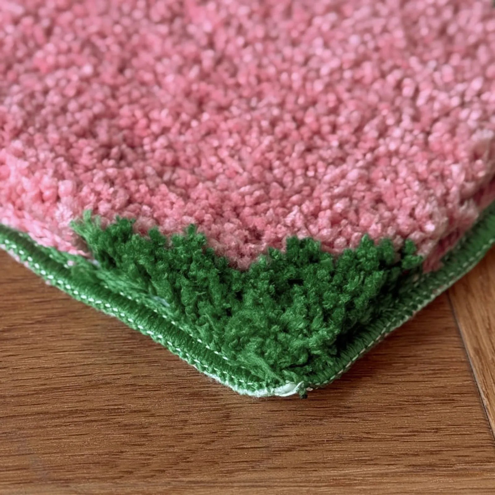 Corner view showing plush pile and green diamond details - RoomDen