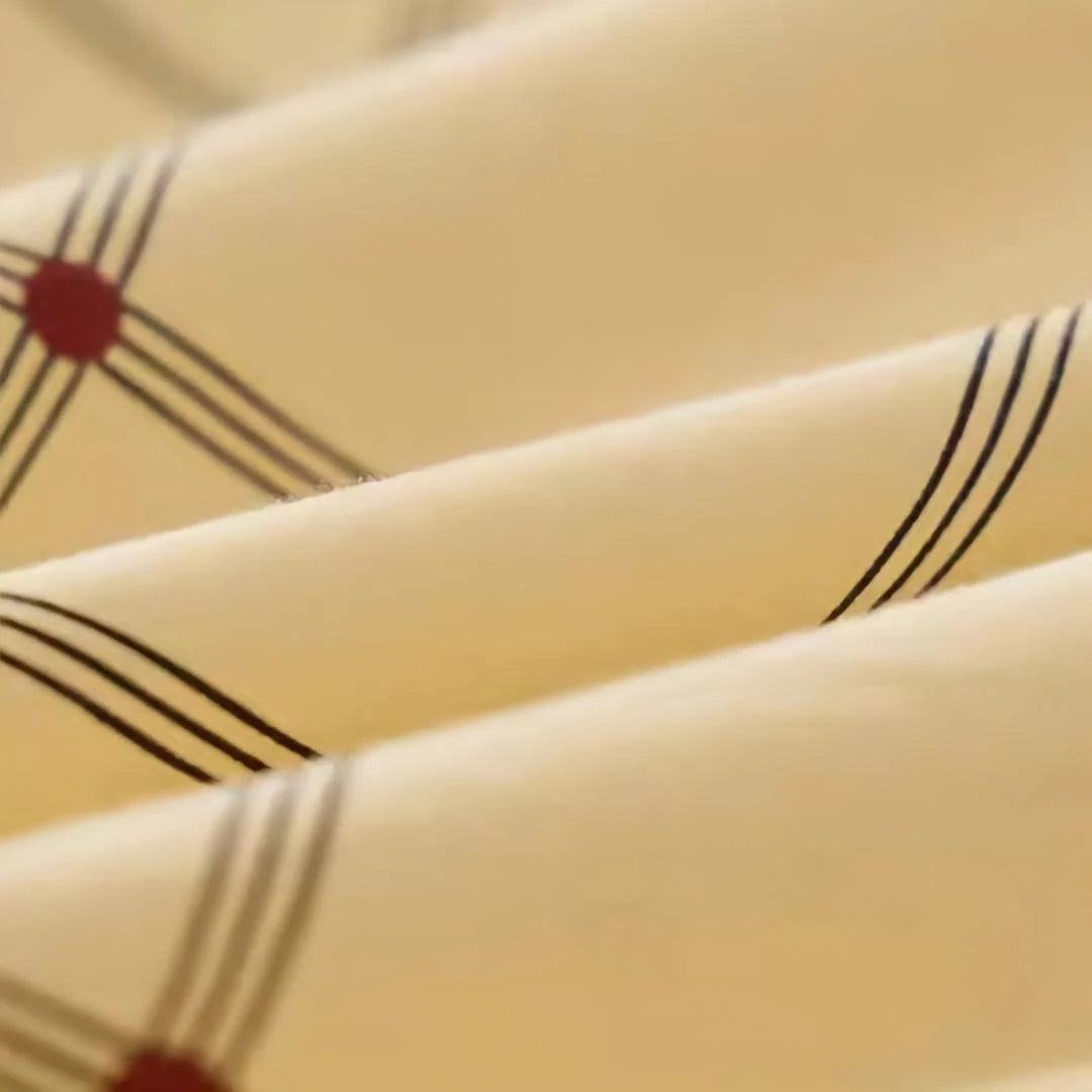 Macro shot showing the fine texture and printed details of the cotton fabric. - RoomDen