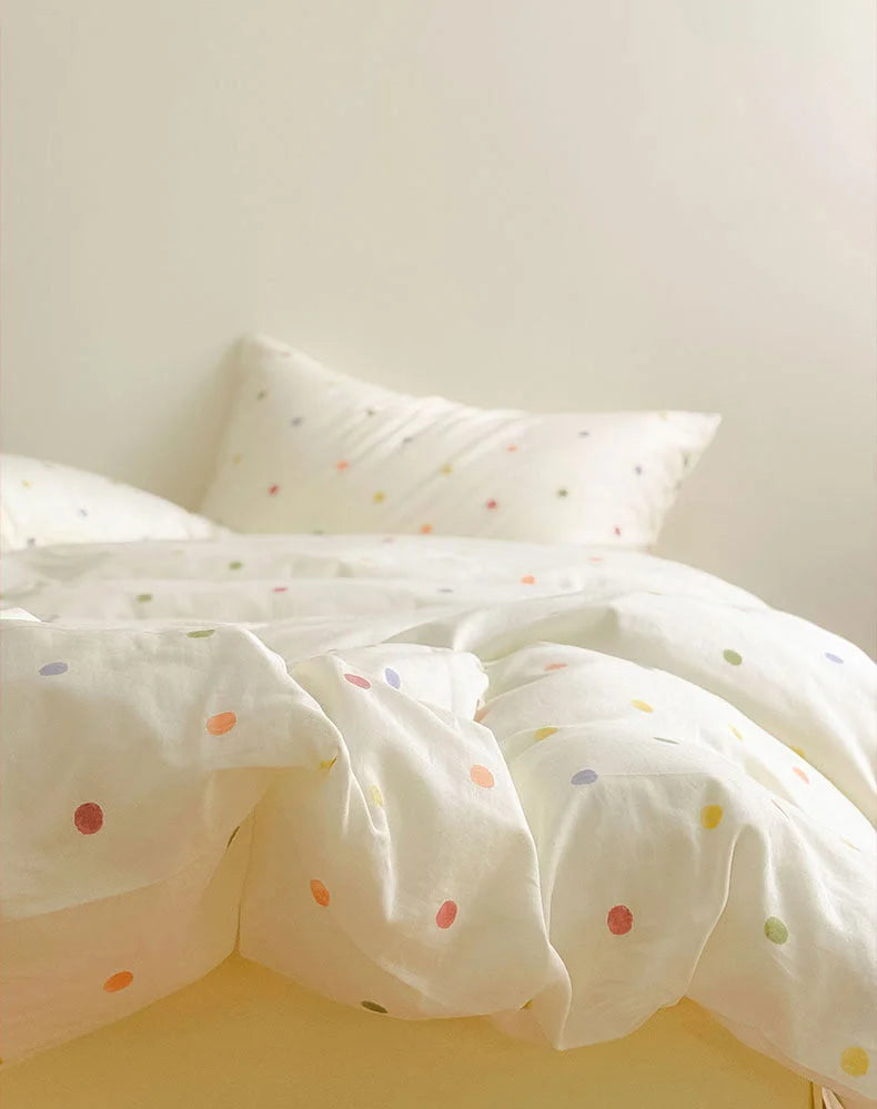 Soft folds of the Colorful Polka Dot Washed Cotton Duvet Cover showing its signature texture - RoomDen
