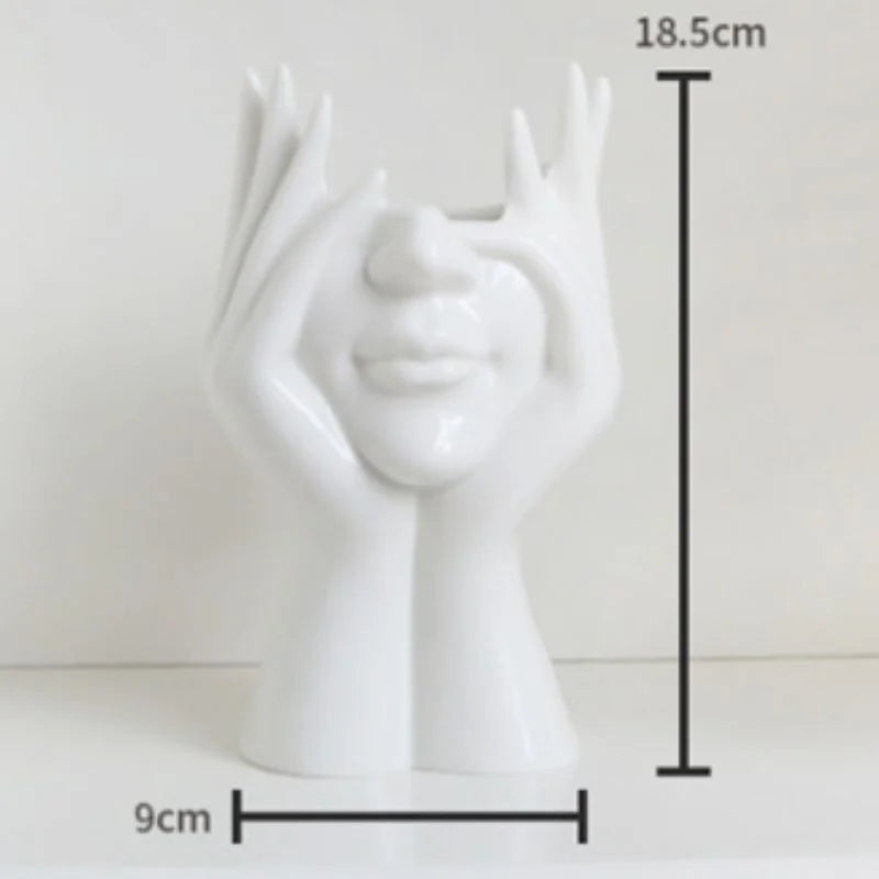 The 'Peekaboo' pose white face vase with dimensions 18.5cm by 9cm displayed - RoomDen.