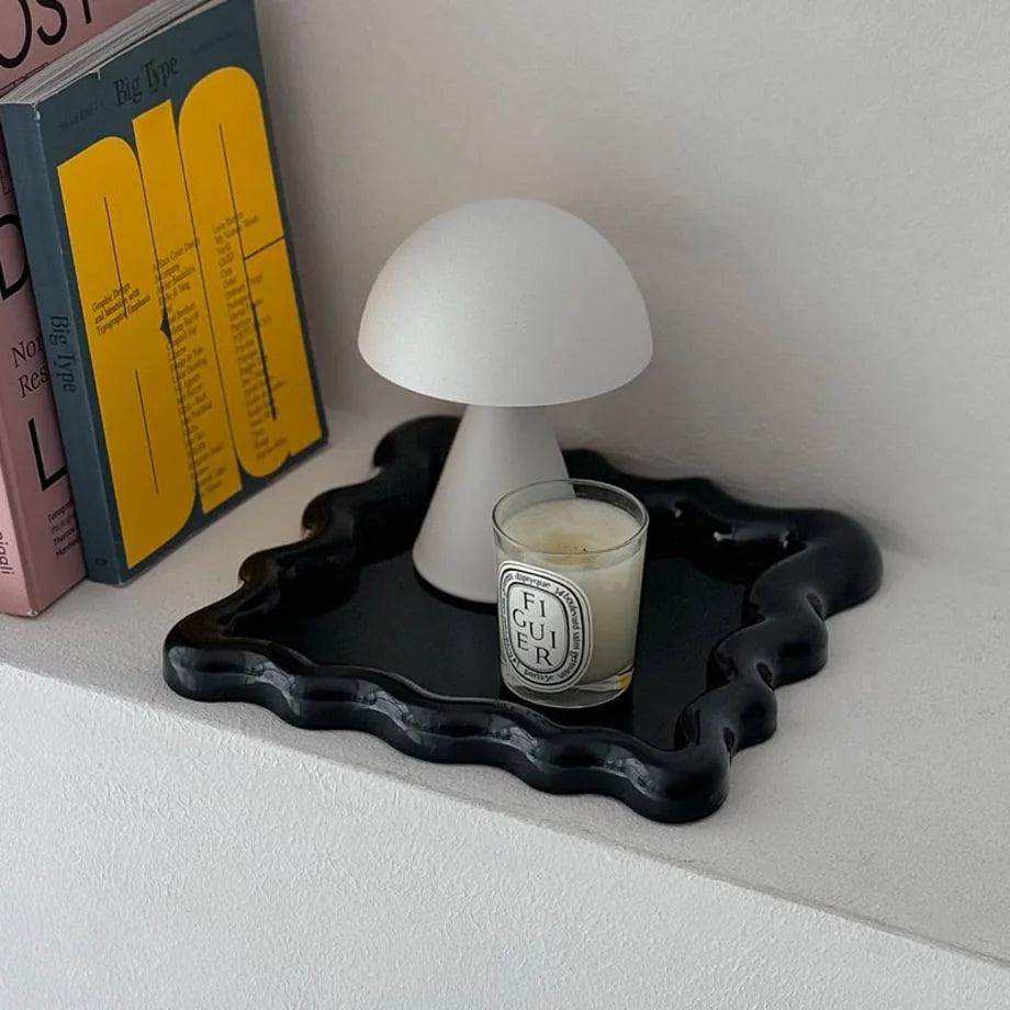 Styled shot of the Glossy Black trinket tray adding contrast to a bright shelf display - RoomDen