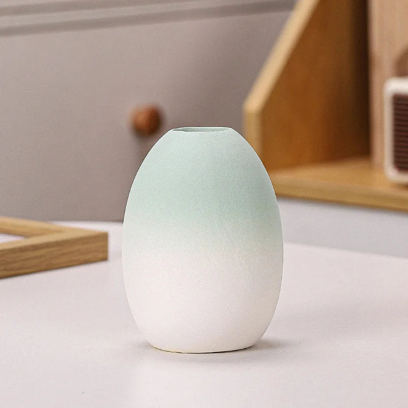 Green Ombre egg-shaped frosted ceramic vase on a white surface - RoomDen.