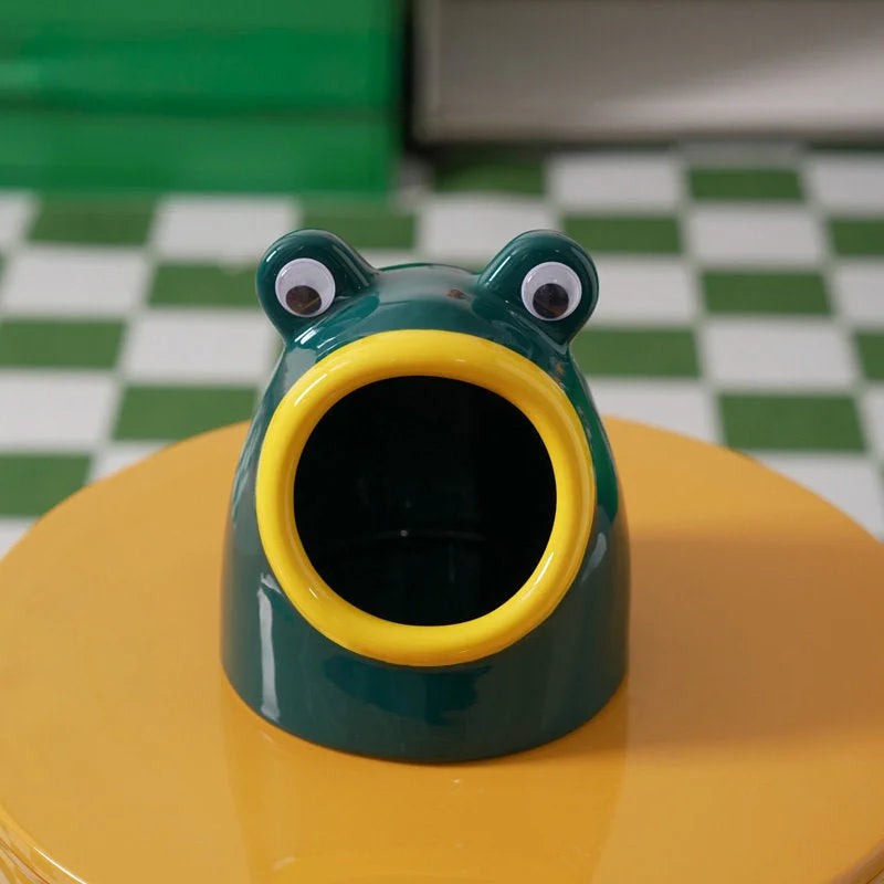 A green and yellow Googly Eye Frog ceramic organizer, showing a color variant. - RoomDen