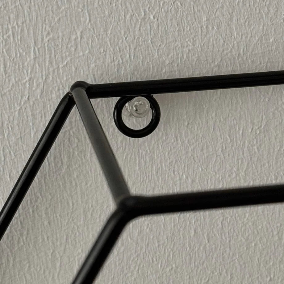 Detail of the mounting ring on the top of the Black Geometric Hexagon Wall Shelf - RoomDen