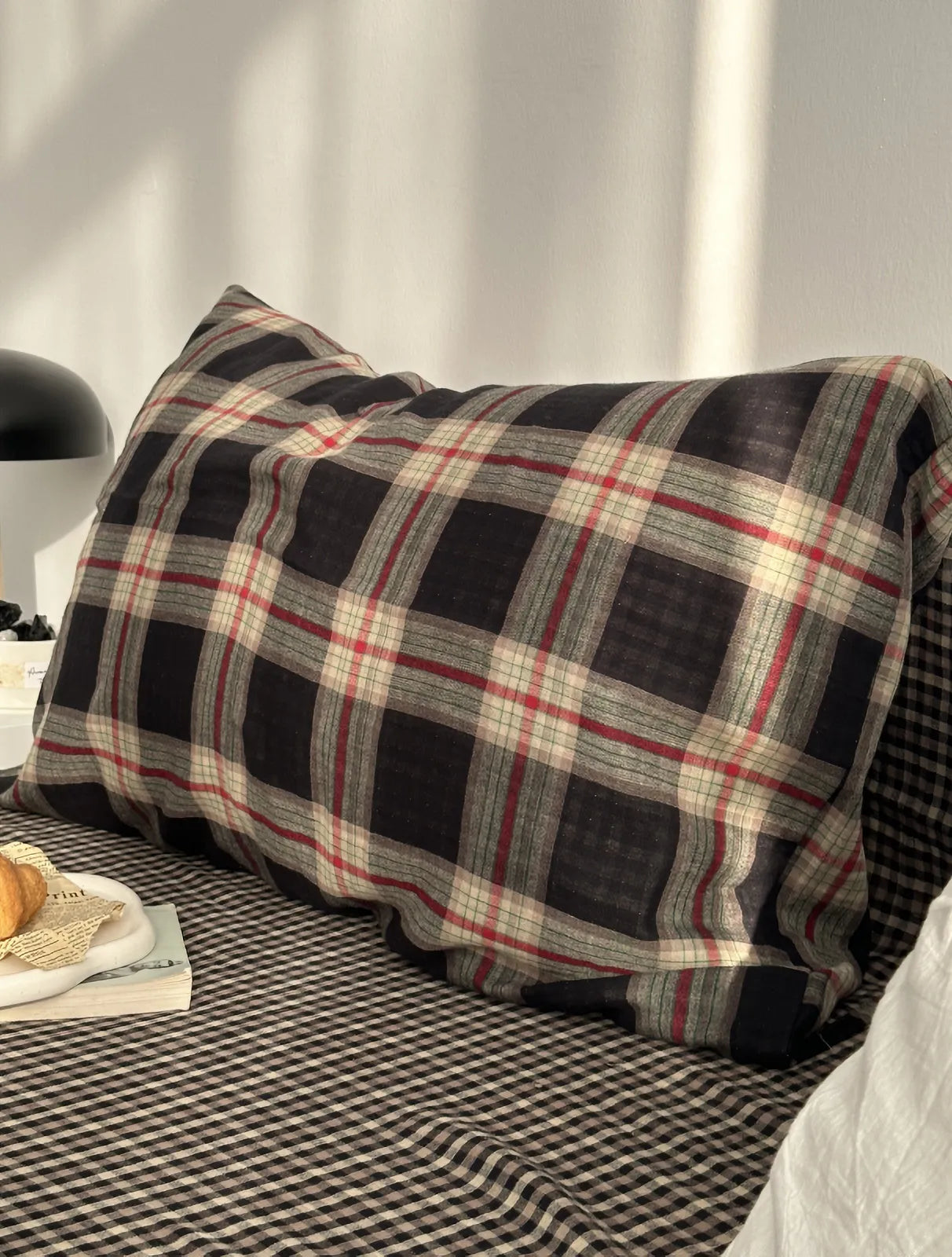 Detail shot of a pillowcase from the Tartan Plaid Washed Cotton Bedding Set showing the classic pattern and fabric texture.