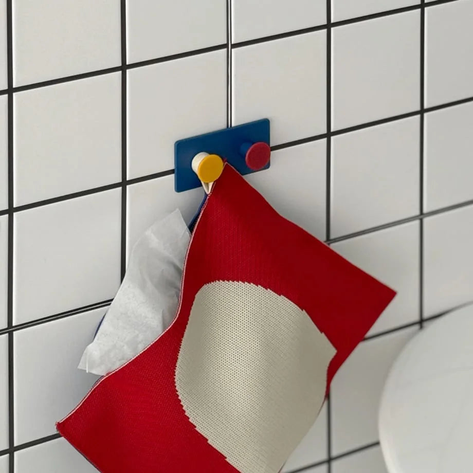 Blue Colorblock Decorative Hook mounted on a white tiled wall, holding a red and white patterned towel - RoomDen.