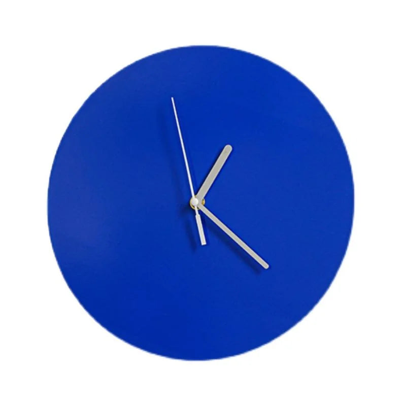 Front view of the Klein blue minimalist round wall clock on a pure white background, highlighting its simple silver hands - RoomDen.