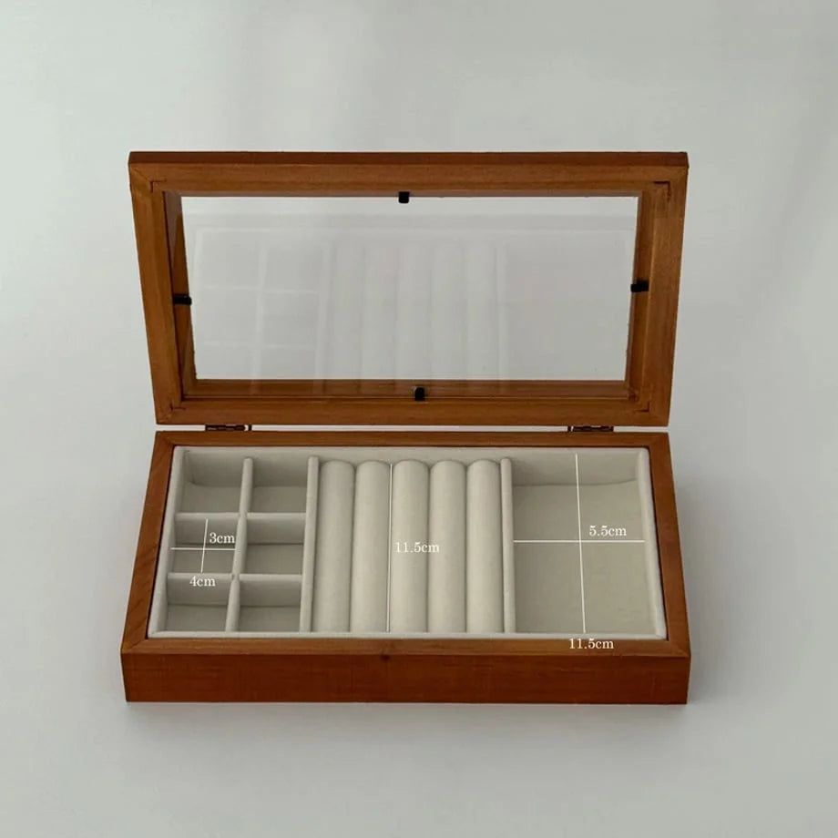 The open wood jewelry organizer with internal compartment dimensions displayed.
