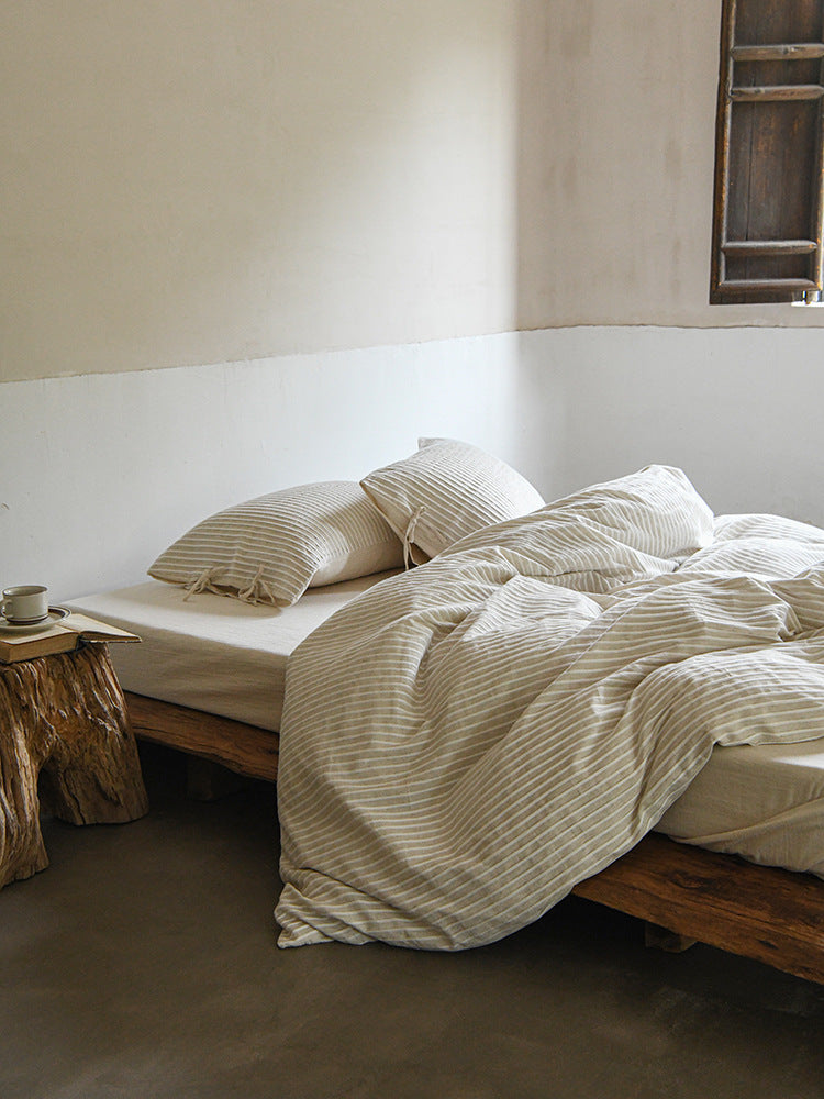 Ashfield Ivory Pinstripe Bedding Set – Ivory pinstripe bedding beside the window - Roomden