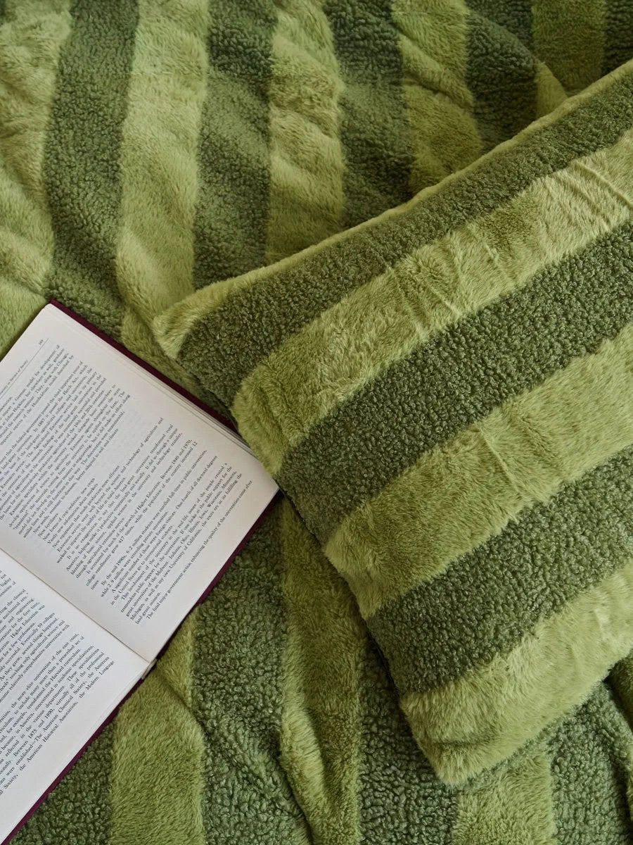 Macro shot of the high-low pile texture on green flannel fabric - RoomDen